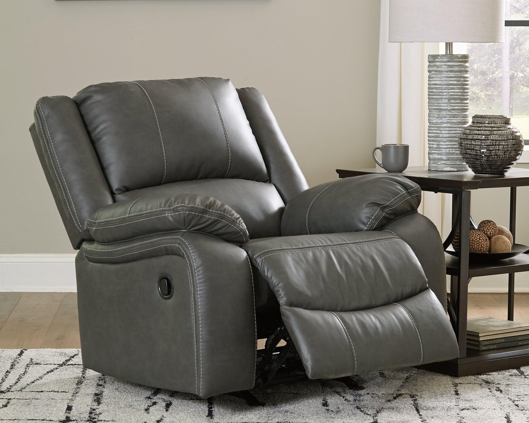 Calderwell Gray Faux Leather Recliner - Ella Furniture