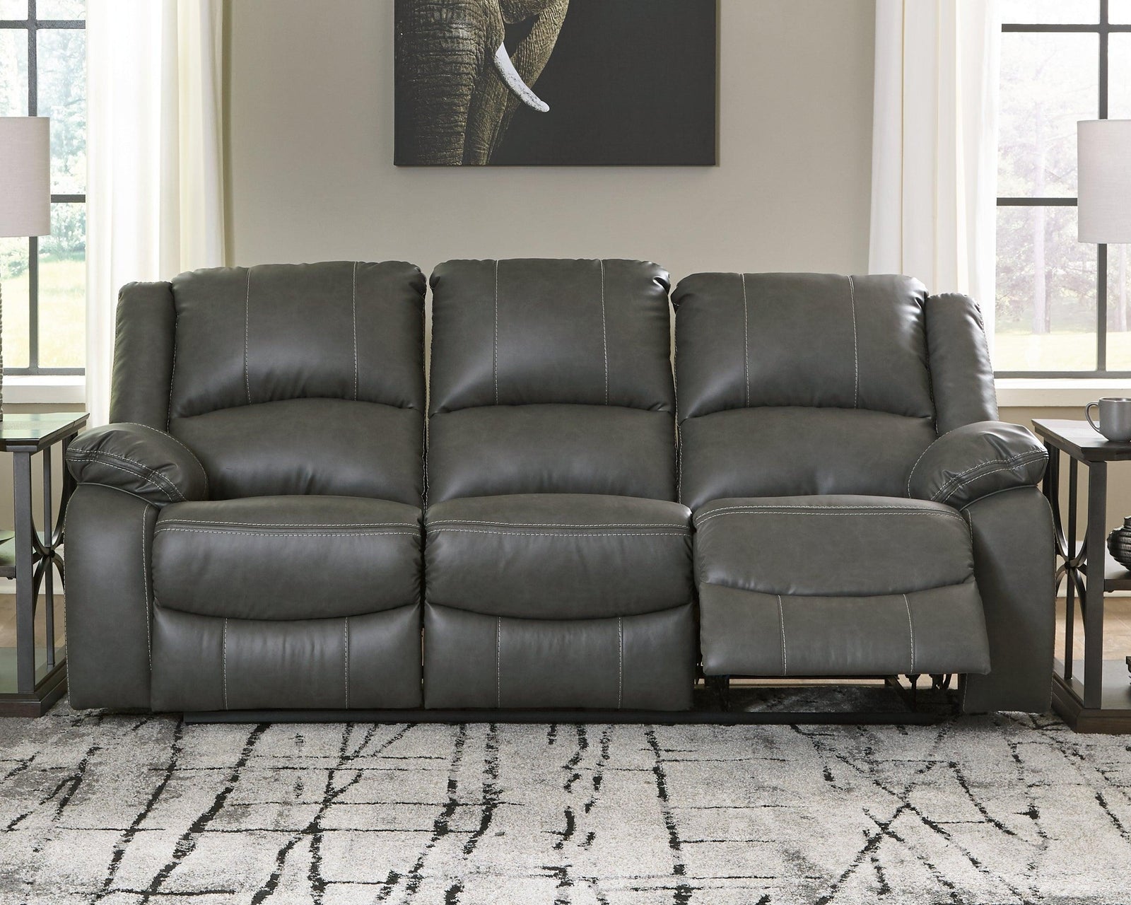 Calderwell Gray Faux Leather Reclining Sofa