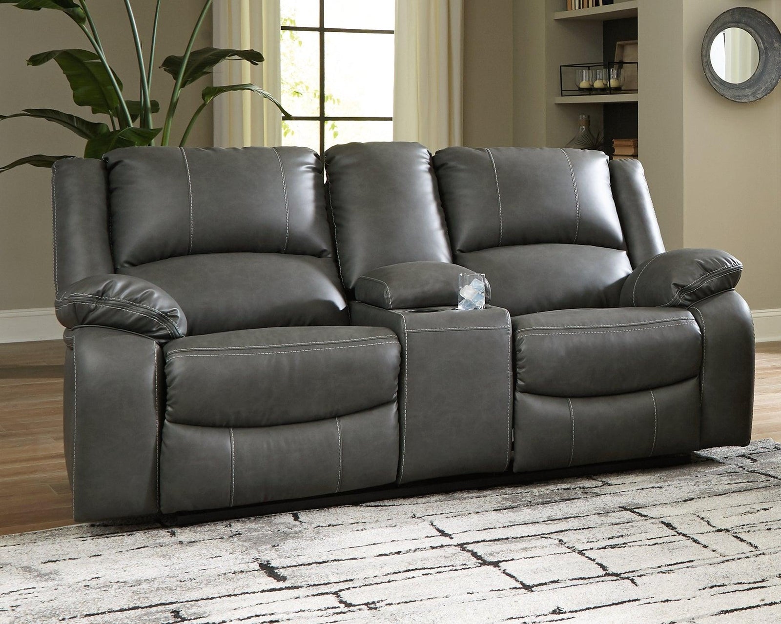 Calderwell Gray Faux Leather Power Reclining Loveseat With Console