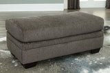 Dorsten Slate Chenille Ottoman - Ella Furniture