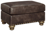 Nicorvo Coffee Faux Leather Ottoman - Ella Furniture