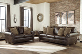 Nicorvo Coffee Faux Leather Sofa - Ella Furniture