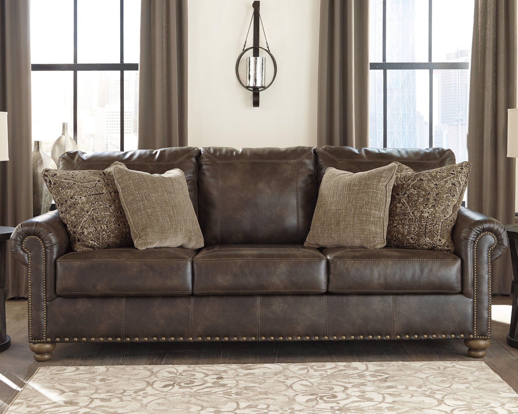 Nicorvo Coffee Faux Leather Sofa - Ella Furniture