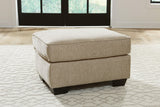 Ardmead Putty Chenille Ottoman - Ella Furniture