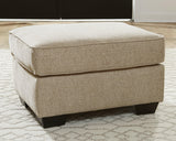 Ardmead Putty Chenille Ottoman - Ella Furniture