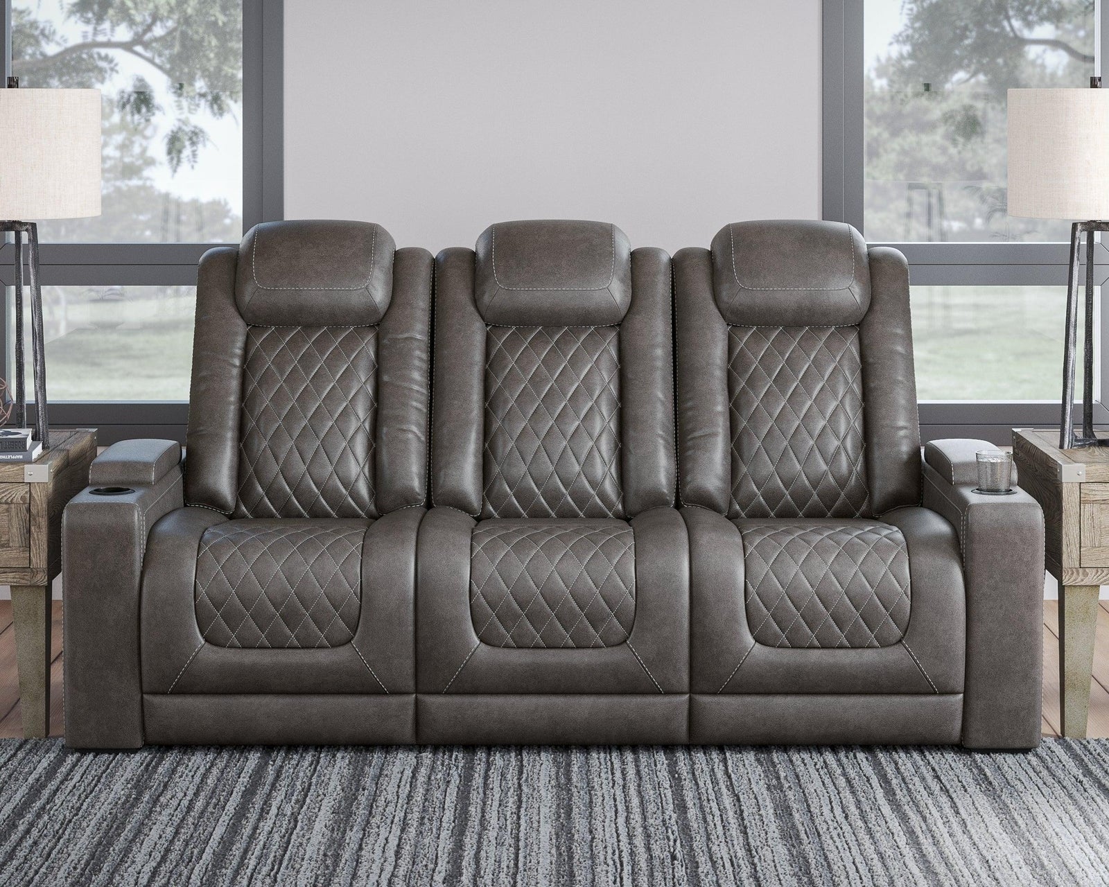 Hyllmont Gray Faux Leather Power Reclining Sofa