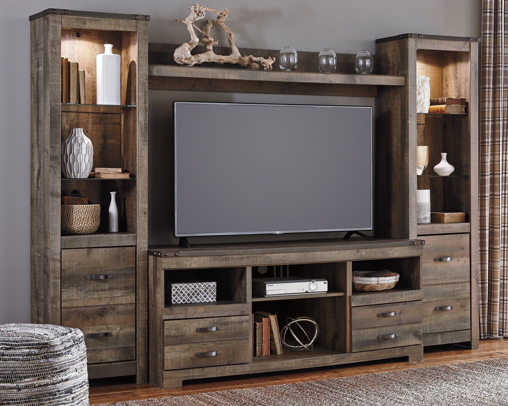 Trinell Brown 4-Piece Entertainment Center - Ella Furniture