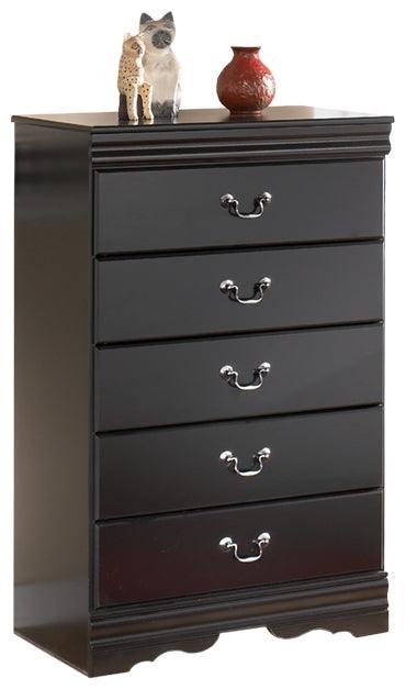 Side angle of Huey Vineyard Black Chest of Drawers highlighting Louis Philippe moulding