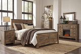 Trinell Brown Dresser With Electric Fireplace - Ella Furniture