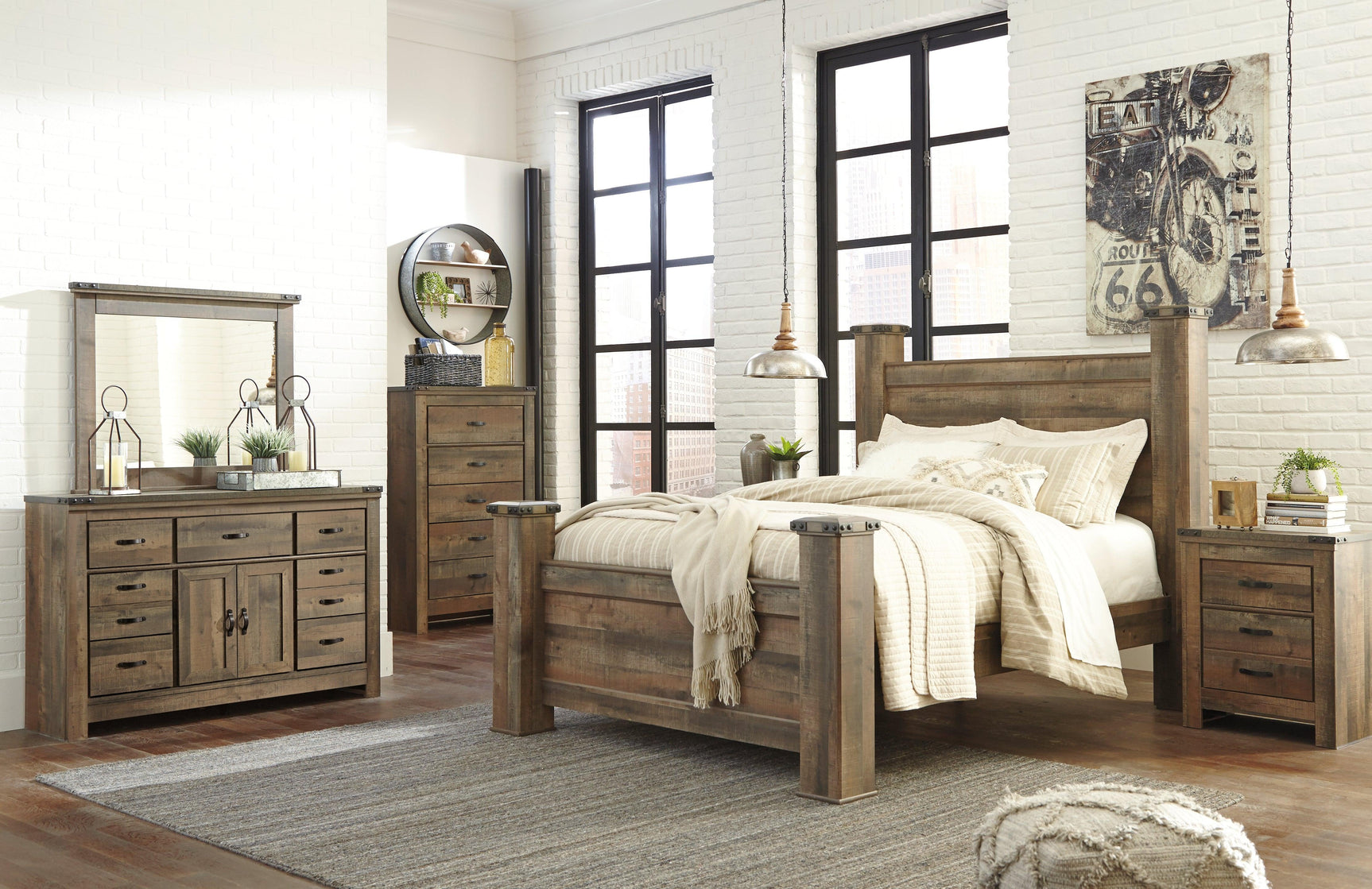 Trinell Brown Queen Poster Bed - Ella Furniture