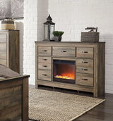 Trinell Brown Dresser With Electric Fireplace - Ella Furniture