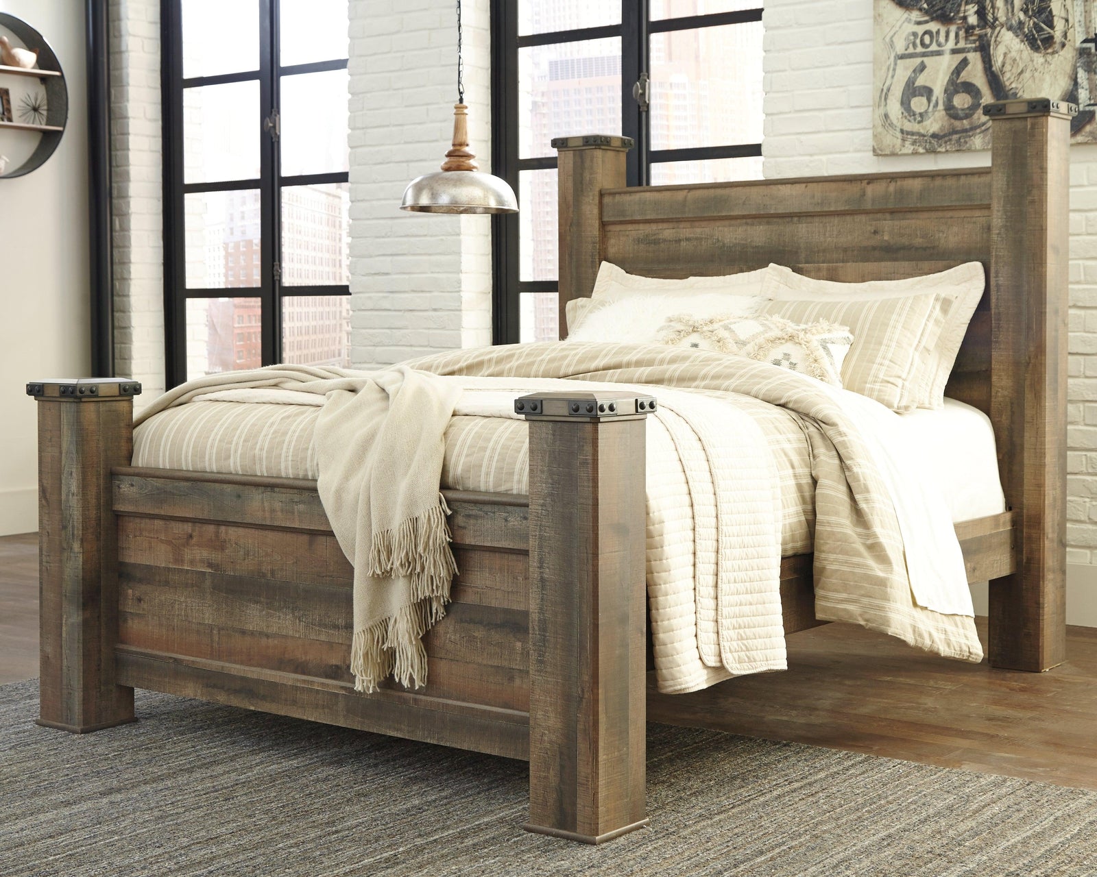 Trinell Brown Queen Poster Bed - Ella Furniture