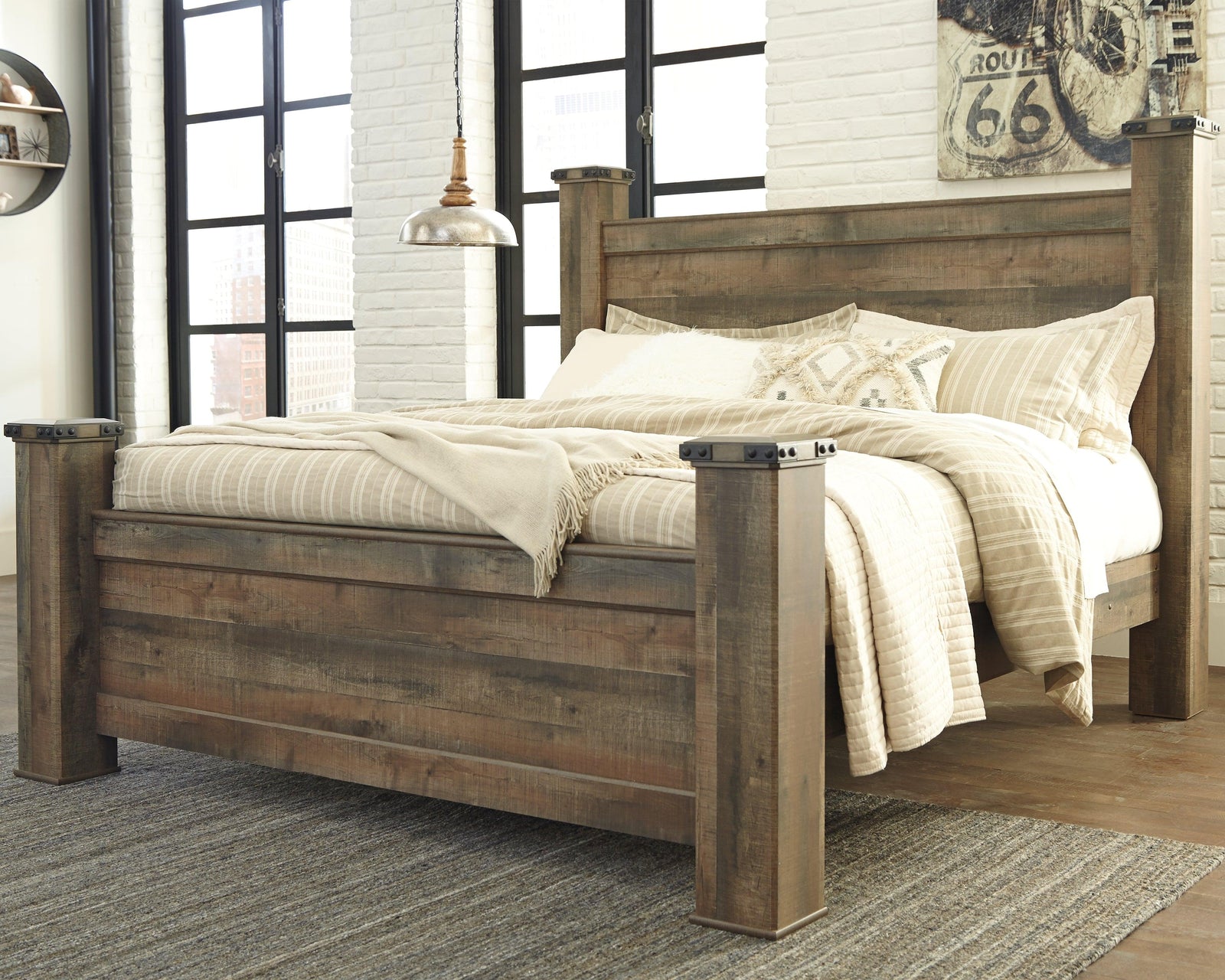 Trinell Brown King Poster Bed - Ella Furniture