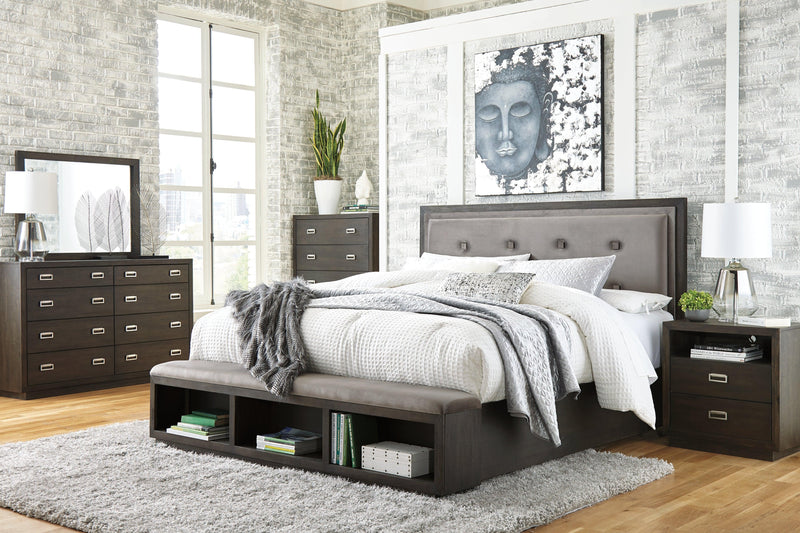 Hyndell Dark Brown Queen Upholstered Panel Bed With Storage