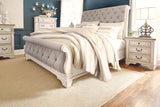 Realyn Chipped White Queen Sleigh Bed - Ella Furniture