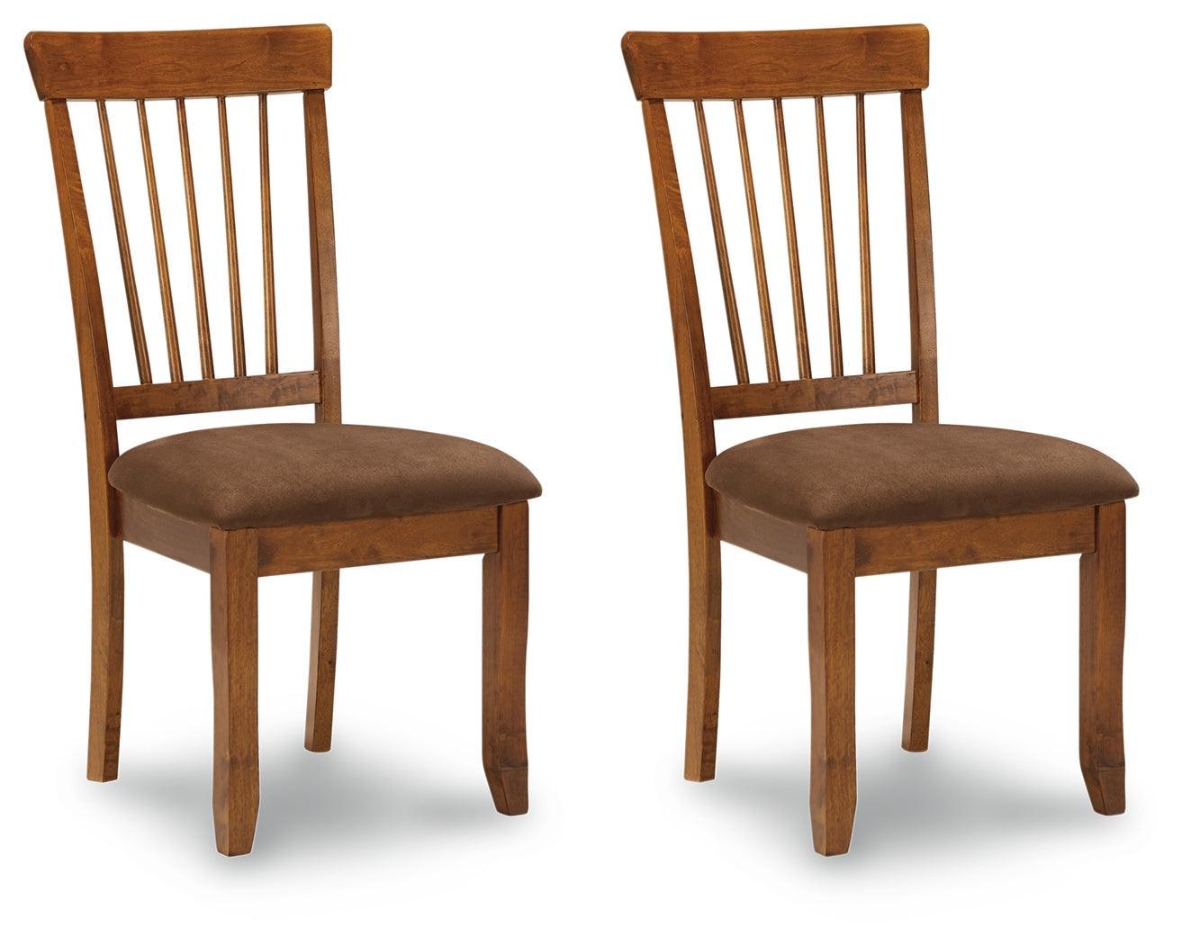 Side view of Berringer Brown Upholstered Wood Dining Chair displaying armrest and wood frame