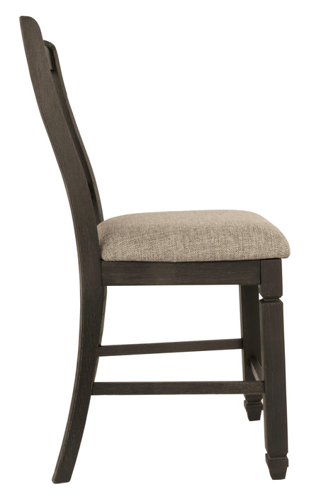 Close-up of grayish brown polyester upholstery and silvertone nailhead trim on stool