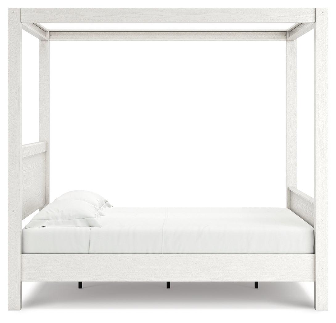 Aprilyn White Queen Canopy Bed - Ella Furniture