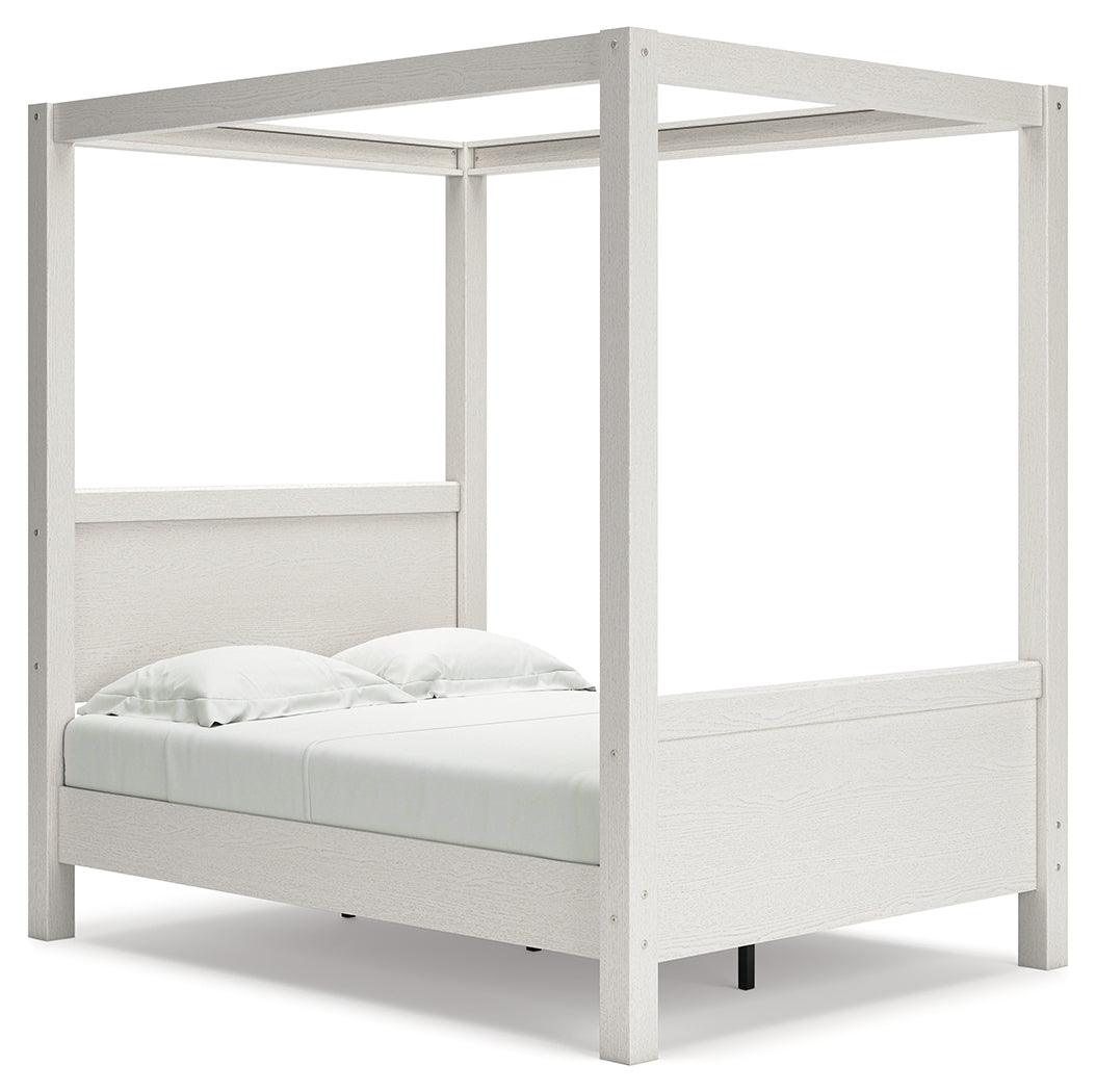 Aprilyn Honey Full Canopy Bed - Ella Furniture