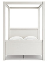 Aprilyn Honey Full Canopy Bed - Ella Furniture