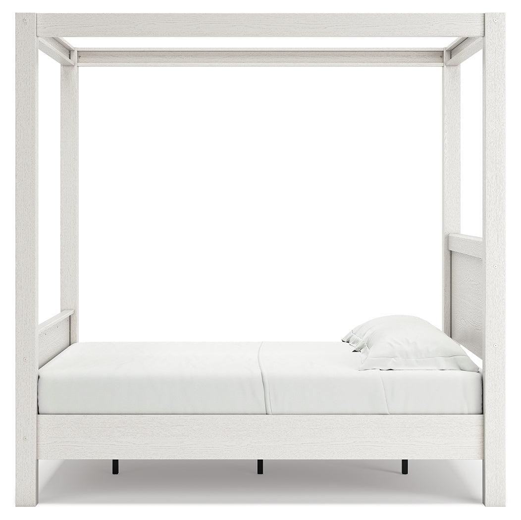 Aprilyn Honey Full Canopy Bed - Ella Furniture