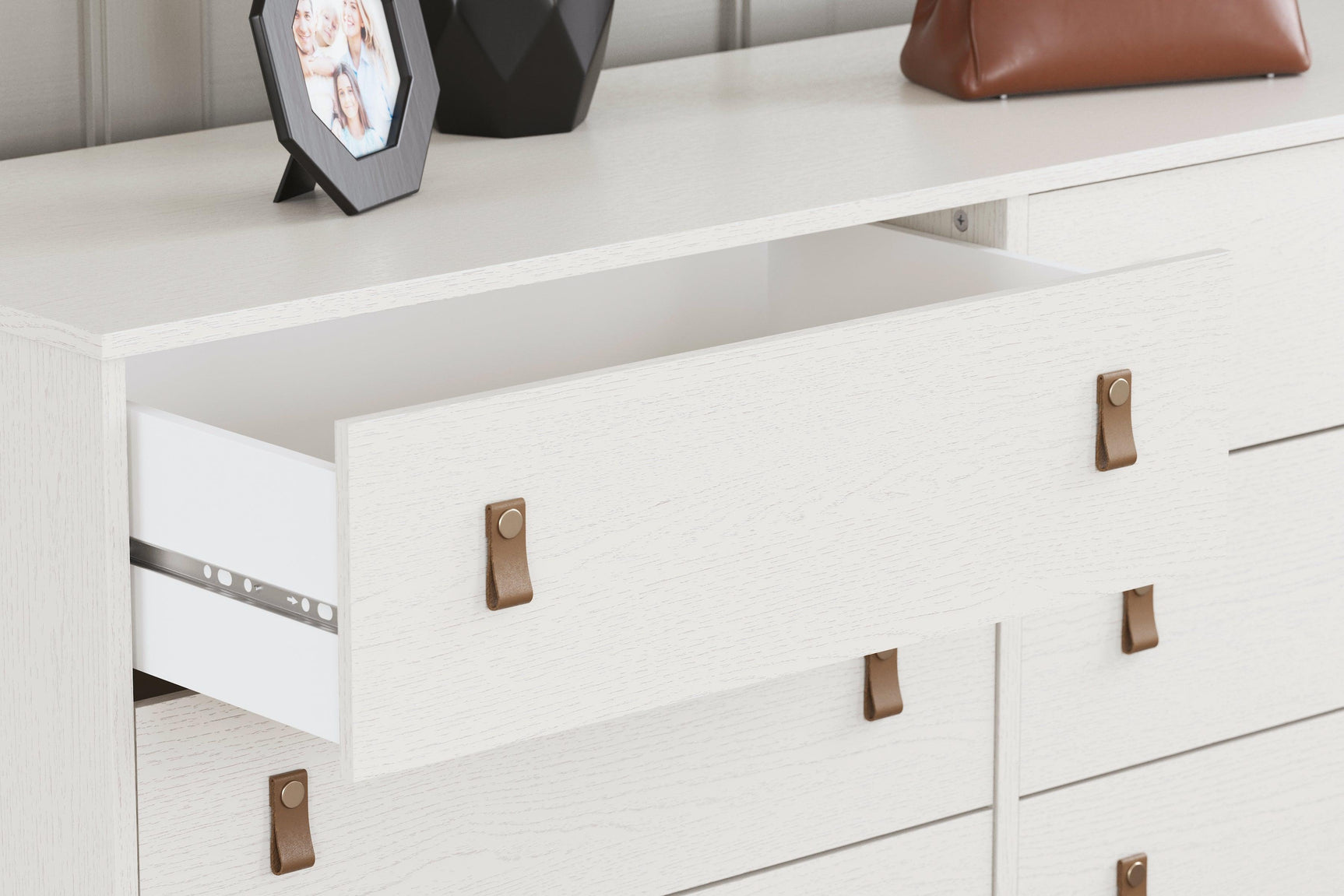 Aprilyn White Dresser - Ella Furniture