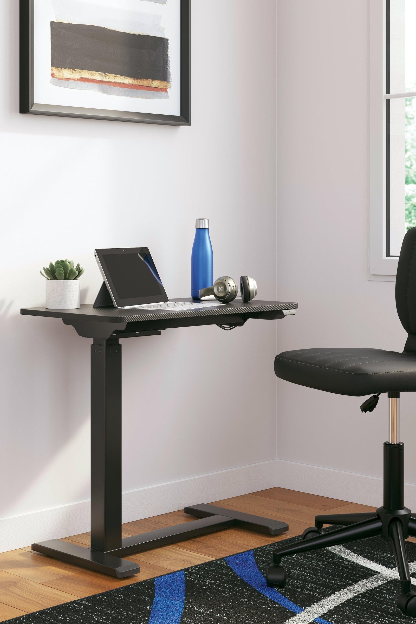 Lynxtyn Black Adjustable Height Home Office Side Desk - Ella Furniture
