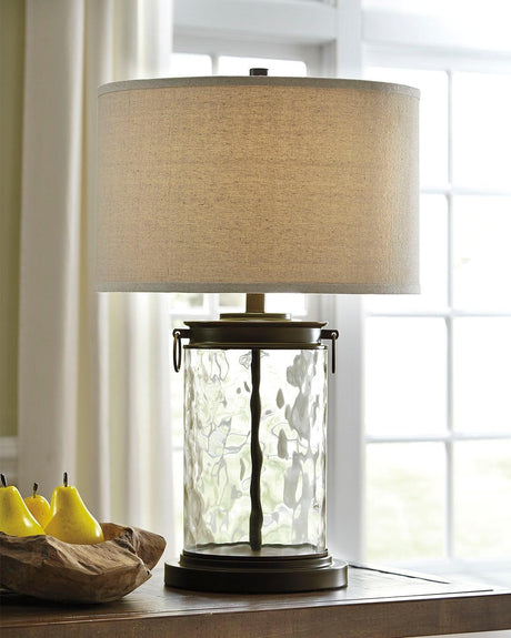 Tailynn table lamp clear wave glass base and bronze metal frame front view