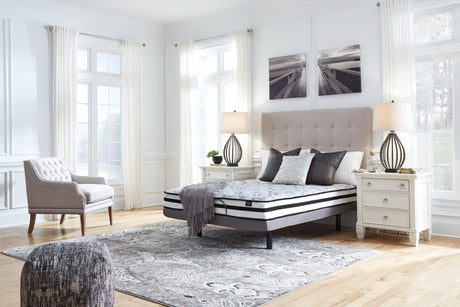 8-Inch Chime Innerspring King Mattress set up on bed frame