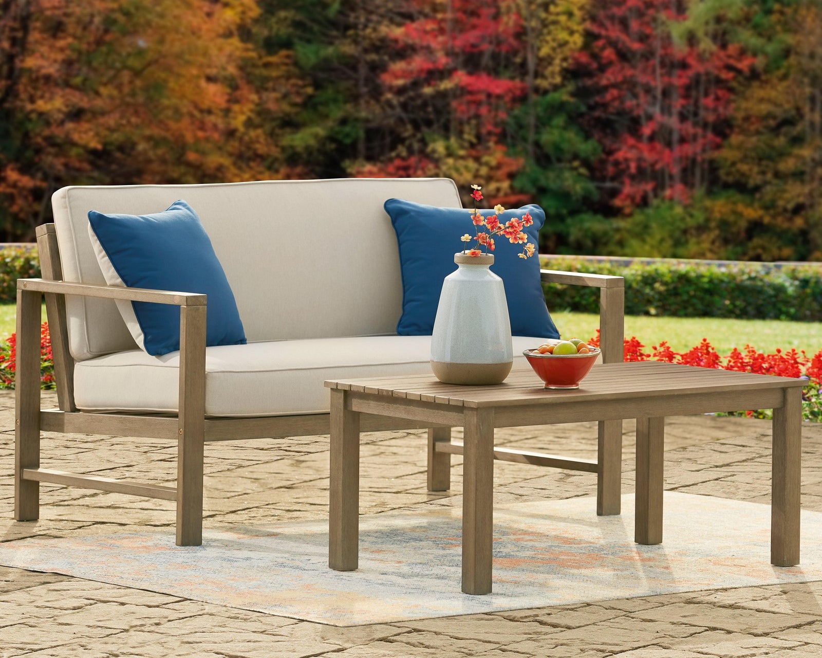 Fynnegan Light Brown Outdoor Loveseat With Table (Set Of 2)