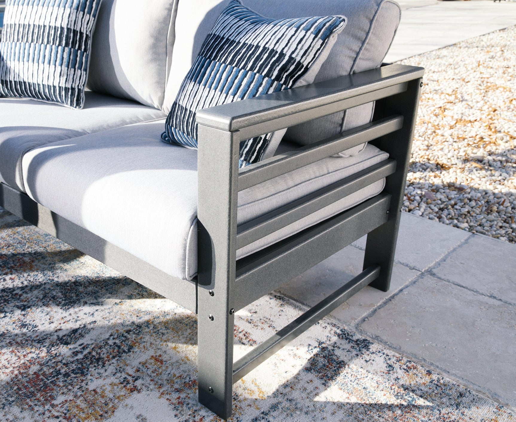 Amora Charcoal Gray Outdoor Loveseat With Cushion - Ella Furniture