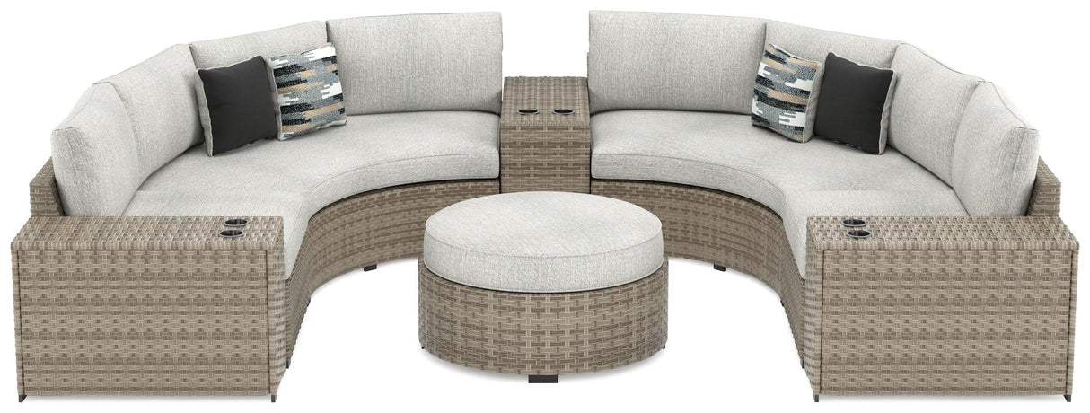 Calworth Beige 7-Piece Outdoor Sectional With Ottoman - Ella Furniture