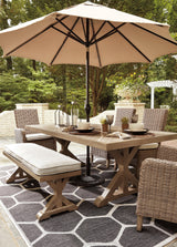 Beachcroft Beige Dining Table With Umbrella Option - Ella Furniture