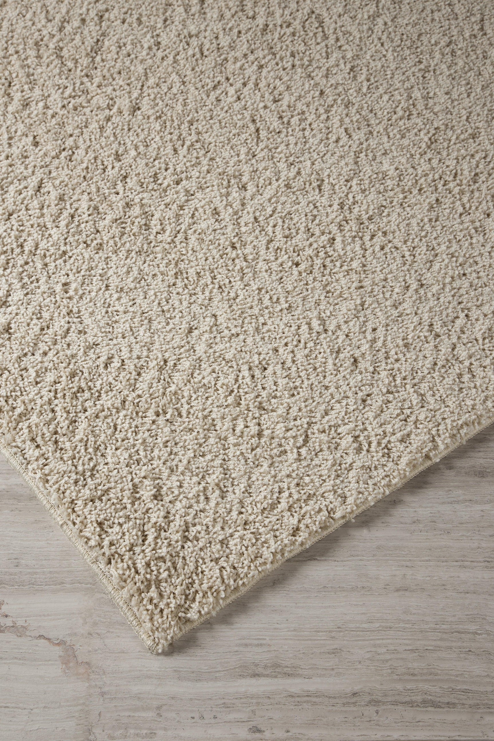 Caci Cream 5' X 7' Rug - Ella Furniture