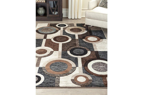 Guintte Multi 5 foot by 6 foot 7 inch geometric pattern rug angled view