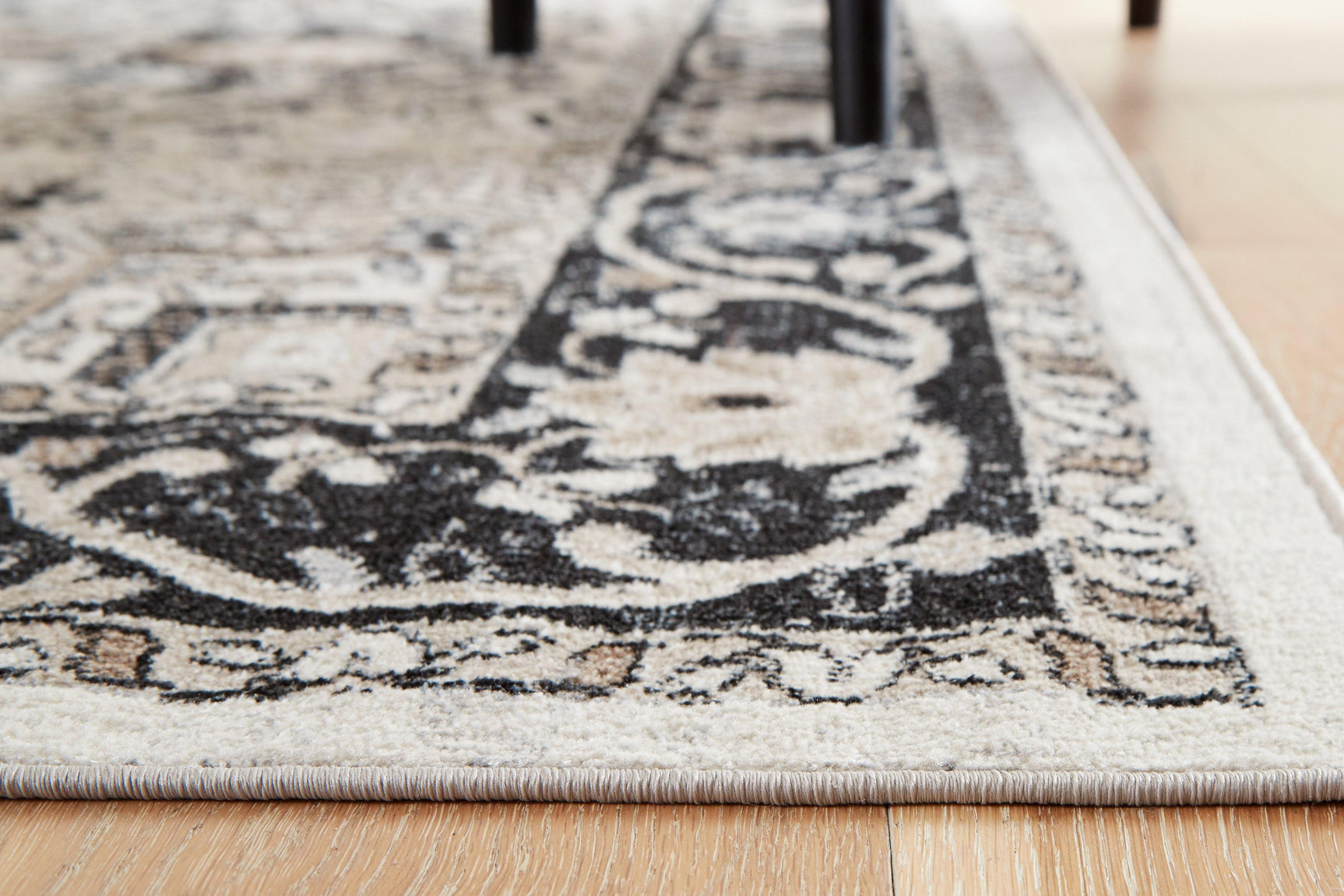 Gregmoore Multi 5'2" X 6'10" Rug - Ella Furniture