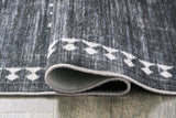 Arloman Black/cream/gray 5' X 7' Rug - Ella Furniture