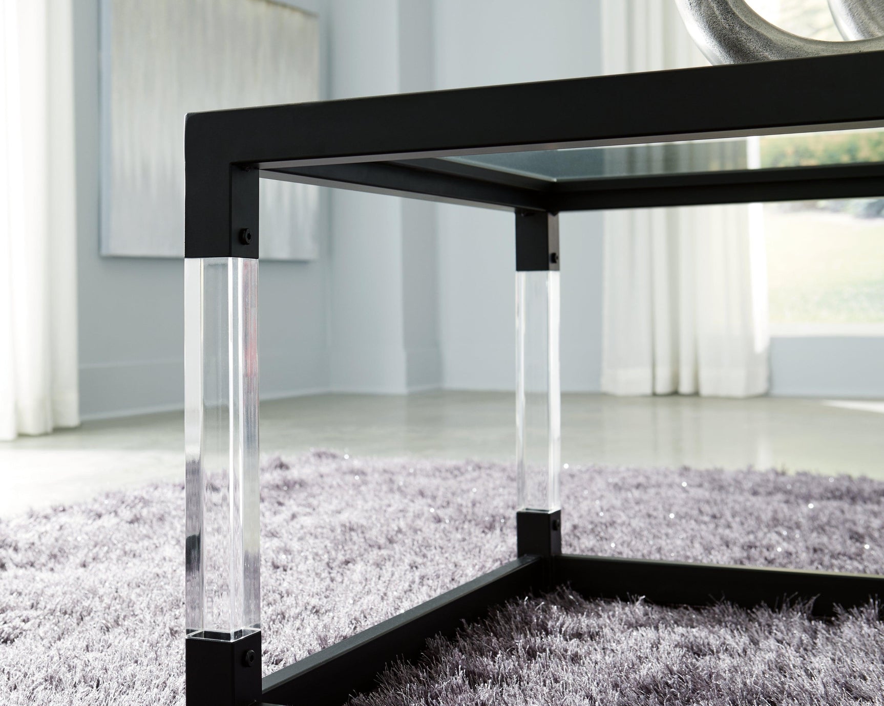 Nallynx Metallic Gray Coffee Table - Ella Furniture