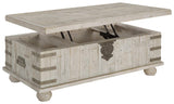 Carynhurst White Wash Gray Coffee Table With Lift Top - Ella Furniture