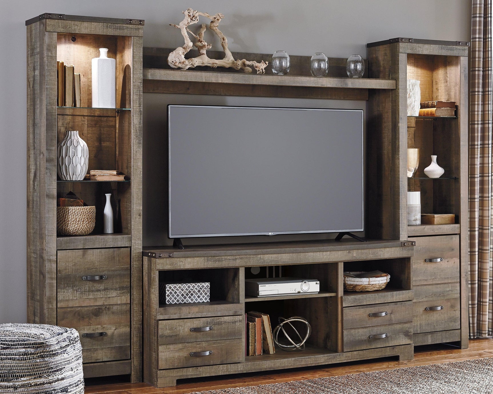 Trinell Brown 4-Piece Entertainment Center - Ella Furniture